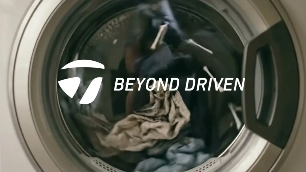 TaylorMade Beyond Driven logo over the Father's Day washing-machine film